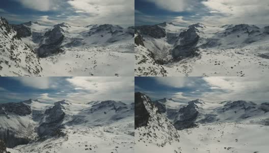 在帕索德尔托纳勒山顶的积雪覆盖的山峰高清在线视频素材下载