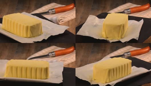 一盘准备吃的黄油包装纸高清在线视频素材下载