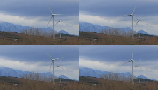 风力涡轮机与戏剧性的天空背景在比利牛斯东方高清在线视频素材下载