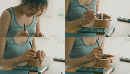 DIY:亚洲妇女使用螺丝刀高清在线视频素材下载