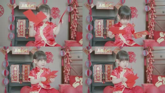 中国小女孩在家庆祝春节高清在线视频素材下载