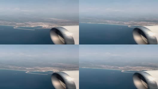 乘客的海景从飞机上的云层-垂直电影高清在线视频素材下载