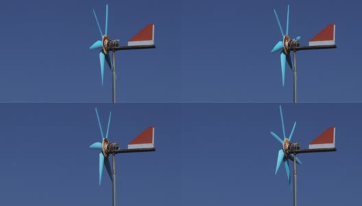 近距离的风力涡轮机与蓝天背景。概念自然与环境。高清在线视频素材下载