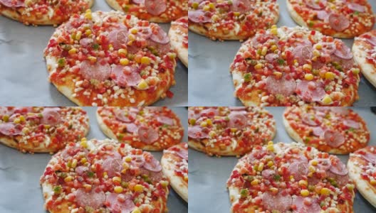 烤盘里的冷冻披萨，即食披萨，冷冻食品，高清在线视频素材下载