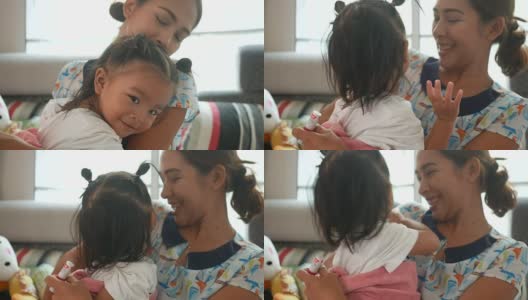 亚洲女婴与母亲拥抱高清在线视频素材下载