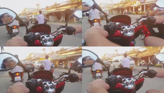 骑摩托车的人戴着墨镜在热带岛屿上行驶，在美丽的日落慢镜头。泰国。苏梅岛,1920 x1080高清在线视频素材下载