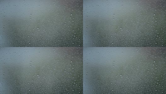 雨滴从房间的玻璃窗上滑下来高清在线视频素材下载