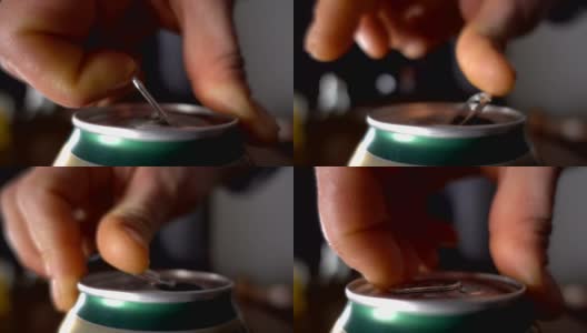 特写的手打开一个啤酒罐，慢动作高清在线视频素材下载
