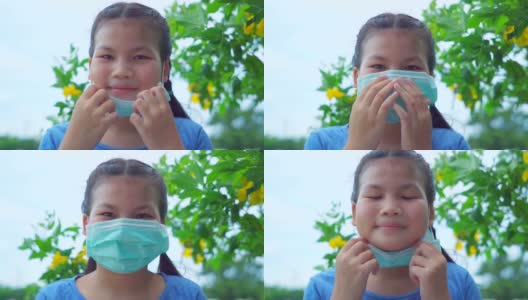少女戴口罩微笑应对新冠肺炎疫情，慢镜头高清在线视频素材下载