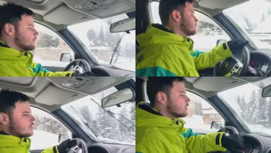 一个人开着车经过雪道。高清在线视频素材下载