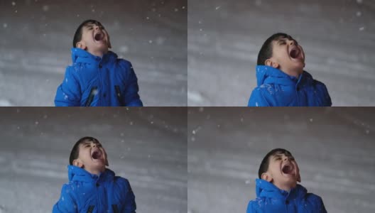 学前班的男孩晚上在雪地里玩。高清在线视频素材下载
