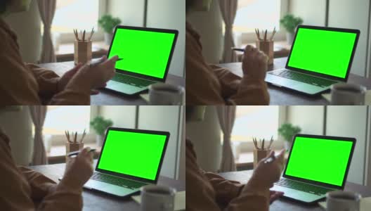 老商人女企业家用色度键绿色笔记本电脑进行在线会议培训高清在线视频素材下载