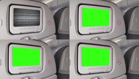 飞机座位上的白色液晶屏幕打开了色度键绿色屏幕有噪音。放大。近距离拍摄，4K分辨率。高清在线视频素材下载