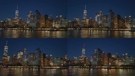夜晚的纽约，曼哈顿和帝国州从船上在哈德逊河，美国高清在线视频素材下载