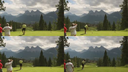打高尔夫球的人在山区球场开球高清在线视频素材下载