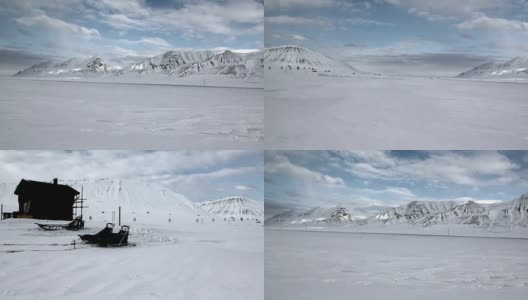 雪橇狗队在北极雪地的背景。高清在线视频素材下载