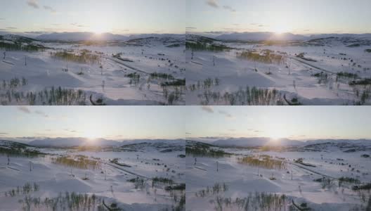 飞越维耶利滑雪胜地，欣赏美丽的日落。高清在线视频素材下载