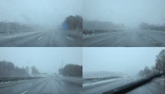 FPV:汽车在暴风雪中快速行驶，路面光滑，能见度低高清在线视频素材下载