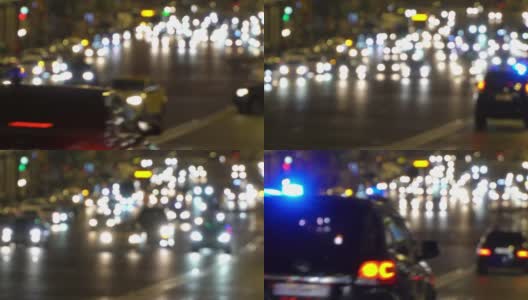 夜城开车灯。交通堵塞。警车的应急灯在夜间失去焦点。雨后潮湿的路面上反射的汽车前灯模糊不清高清在线视频素材下载