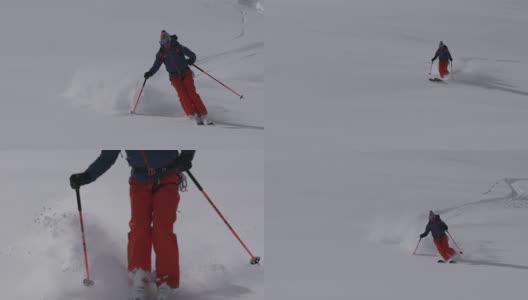 乡间滑雪者下山，积着厚厚的粉雪高清在线视频素材下载