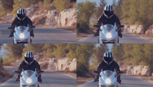 一个骑着白色摩托车的男人高清在线视频素材下载