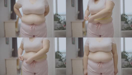 女性测量腰围，控制体重，腹部肥胖，肥胖风险，健康高清在线视频素材下载
