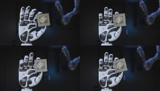 机器人的手握着一个人工智能计算机处理器单元高清在线视频素材下载