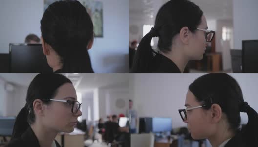 沮丧疲惫的女孩戴着眼镜在办公室里想一些工作的近景高清在线视频素材下载