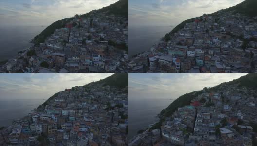 空中贫民窟:黄昏时分，巴西里约热内卢的山顶贫民窟，背景是大海高清在线视频素材下载