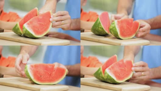 双手健康的金发白种人家庭切片西瓜水果高清在线视频素材下载