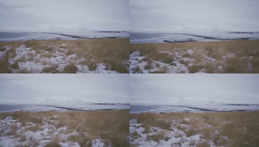 冰岛雪山附近的黑沙滩风景高清在线视频素材下载