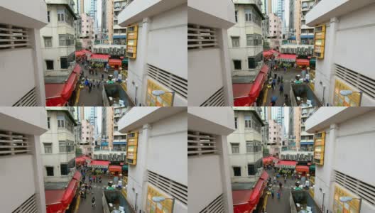 人们走过香港的购物巷高清在线视频素材下载