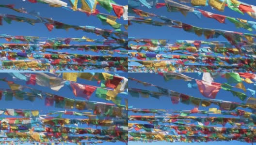 近距离观察:彩色的经幡在西藏随风飘扬。高清在线视频素材下载