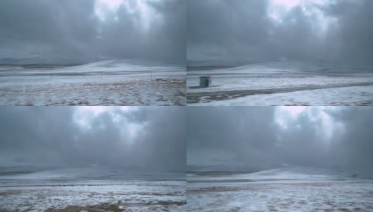 镜头光晕:几缕阳光穿过雪景上方的云层高清在线视频素材下载