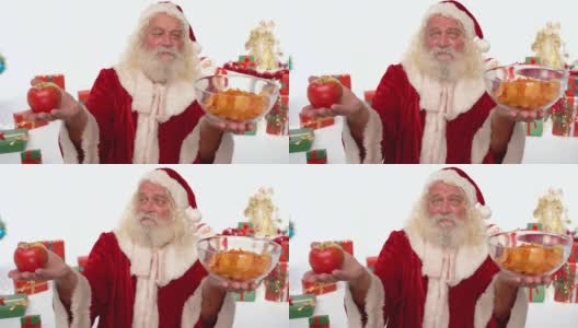 圣诞老人的艰难选择——苹果还是薯片高清在线视频素材下载
