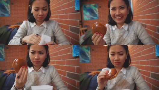 亚洲女人不满意汉堡包，节食高清在线视频素材下载