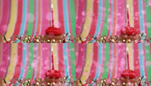 蛋糕与生日蜡烛周围的粉红色泡泡效果高清在线视频素材下载