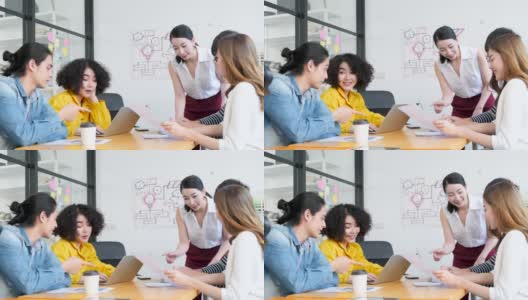 uhd4k亚洲青年创意快乐人集团企业家在商务会议办公室背景良好的领导力和团队精神导致成功手持拍摄高清在线视频素材下载