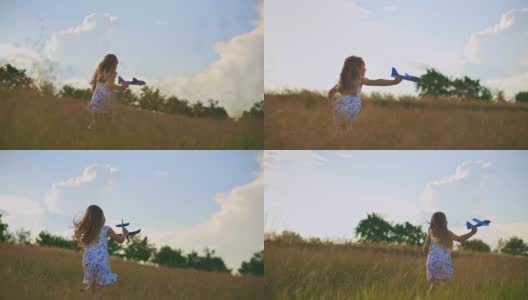 日落时分，美丽的小女孩和她的飞机玩具在草地上奔跑。慢动作高清在线视频素材下载