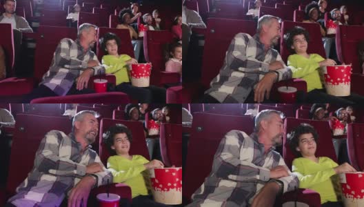 老人和他的孙子在电影院看电影高清在线视频素材下载