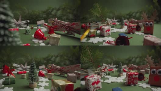 手工制作的圣诞装饰品，有礼品盒，鹿和塑料雪花高清在线视频素材下载