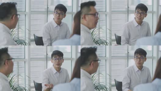 亚洲华人商务人士在办公室商务休息室沙发上闲谈高清在线视频素材下载