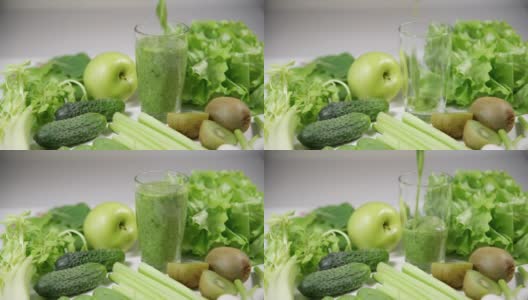 健康理念，绿色抗氧化有机蔬菜，水果和草药和新鲜的冰沙。放在白色的木桌上。与复制空间。高清在线视频素材下载