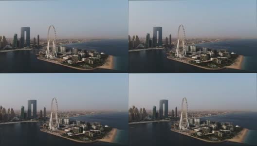 从空中俯瞰阿联酋迪拜的蓝水岛和艾因迪拜摩天轮高清在线视频素材下载