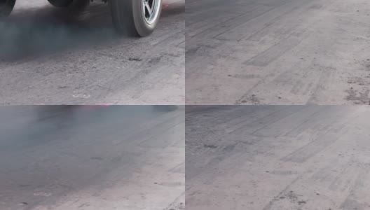 加速赛车在起跑线上燃烧轮胎高清在线视频素材下载