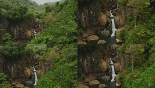 狗狗瀑布，Ciletuh, West Java，印度尼西亚高清在线视频素材下载