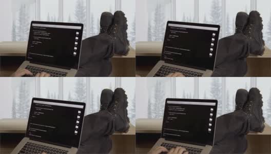 专业程序员在笔记本电脑上编写编程代码高清在线视频素材下载