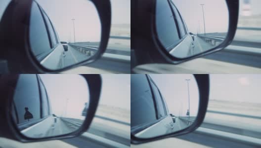 现代汽车的侧后视镜。股票。从车窗到镜子的景色。开车旅行的概念高清在线视频素材下载