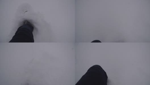 冬天。双腿在雪地里行走高清在线视频素材下载
