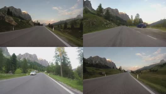 在Dolomites阿尔卑斯山的夕阳下开车高清在线视频素材下载